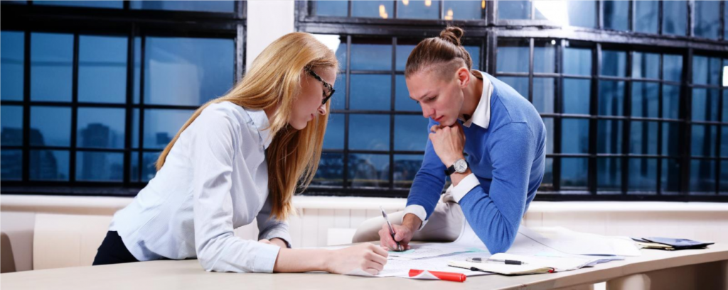 A CQC inspector reviewing official documents