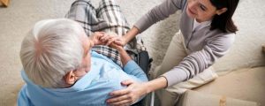 A caregiver assisting an elderly resident - diversity in care